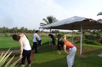 15 jours en retraite de yoga et spa à la plage de Sernabatim, Goa, Inde avec suivi de progression signature