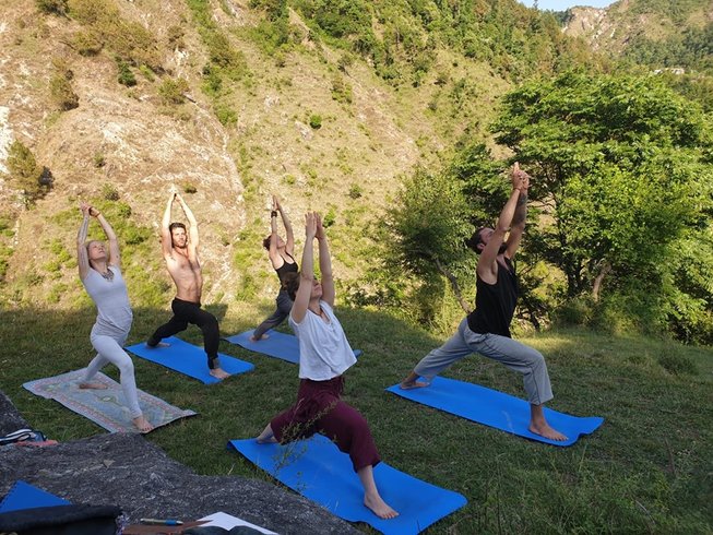 Group practicing yoga outdoors