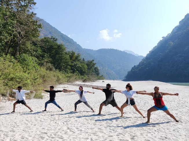 Group practicing Yoga in a stunning spot for yoga retreats in India