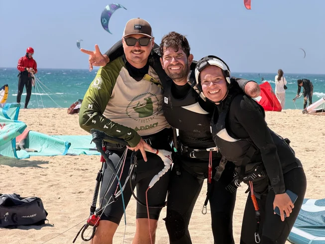 Kitesurfing students and instructor on the beach in Tarifa