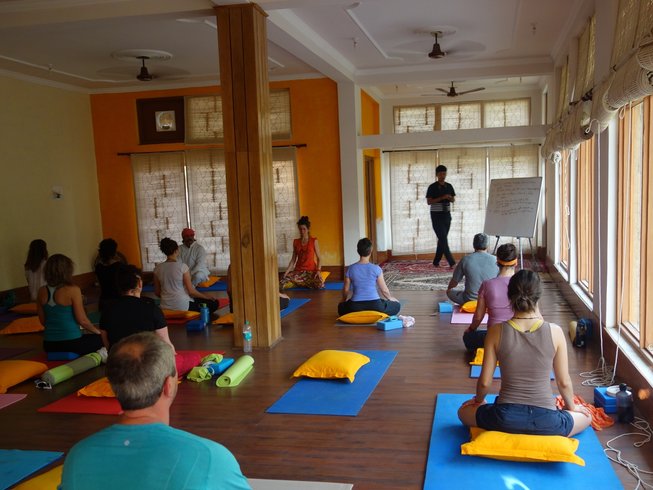 Group practicing Yoga in one of the top yoga retreats in India